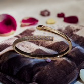 Rose Gold Serpent-Style Bypass Bangle