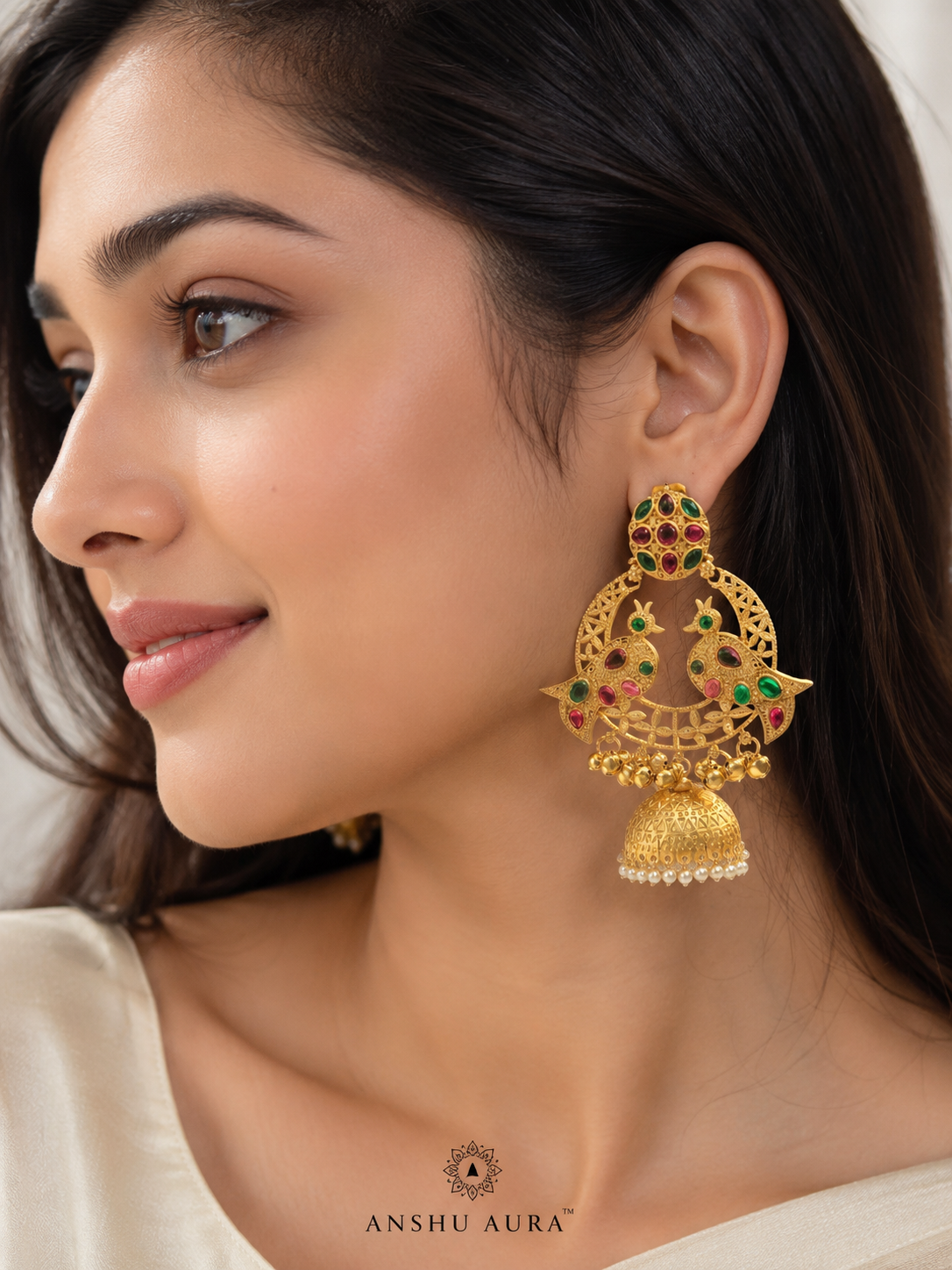 ANSHU AURA™ Peacock Heritage Jhumka Earrings – Premium Gold Finish with Ruby Green Stones & Pearl Dome