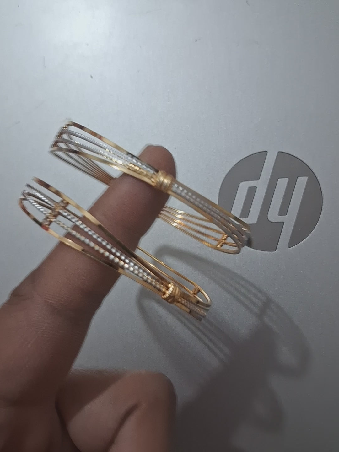 Elegant Triple-Strand Gold & Diamond Bangles