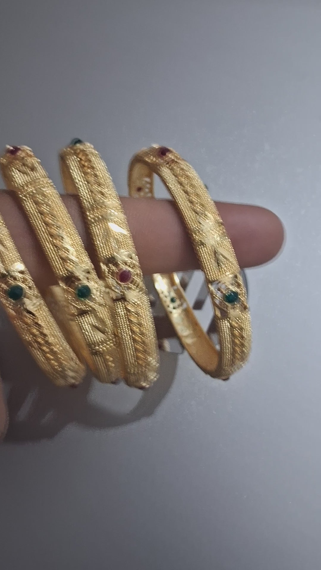 The Rajwada Heirloom Collection: Crafted Bangles with Ruby & Emerald Accents