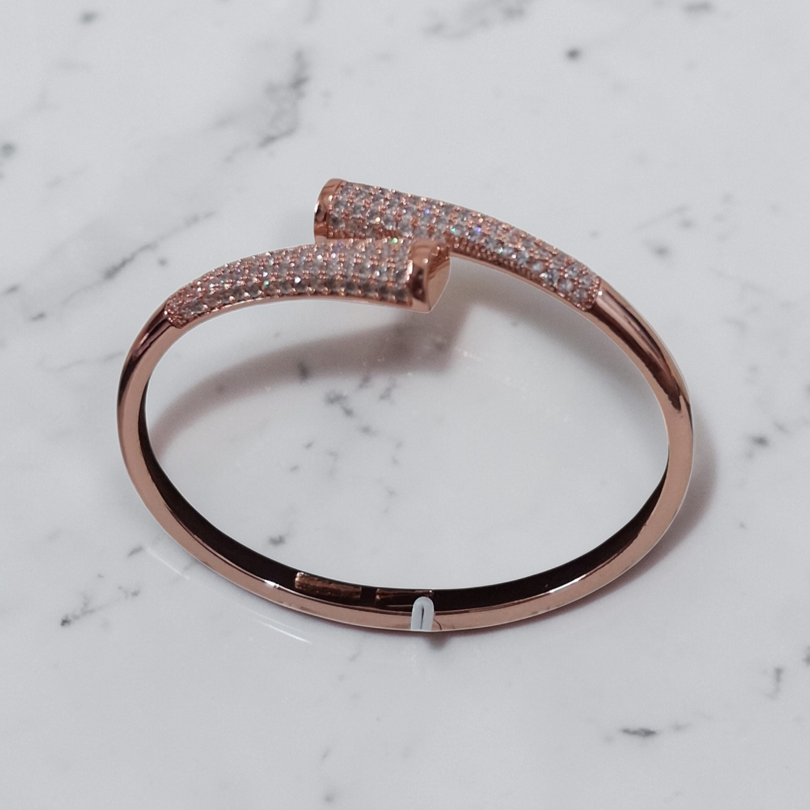The Aura Rose Gold Nail Bypass Bangle