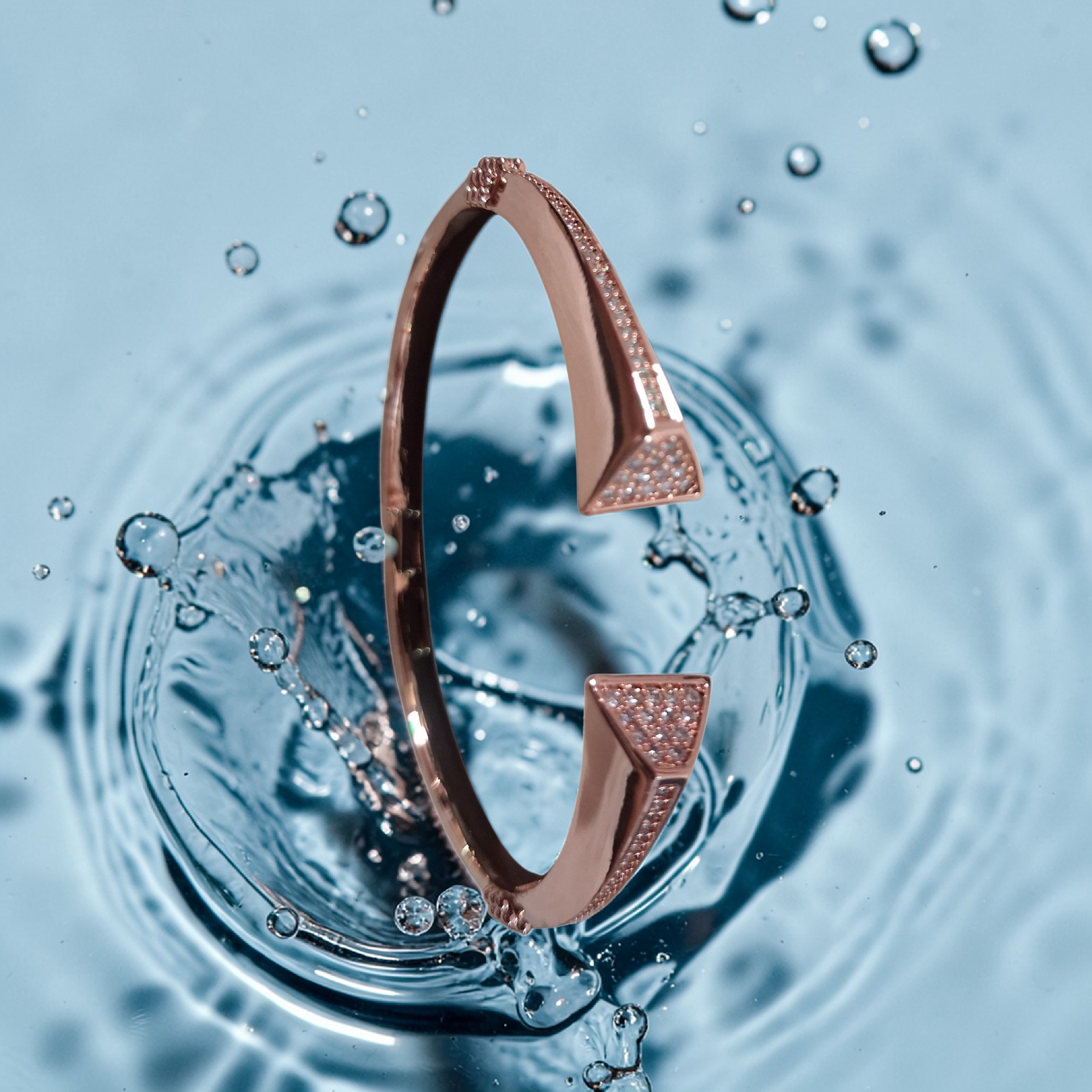 Contemporary rose gold geometric cuff bracelets