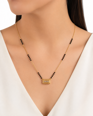 Elegant Black Beaded Gold