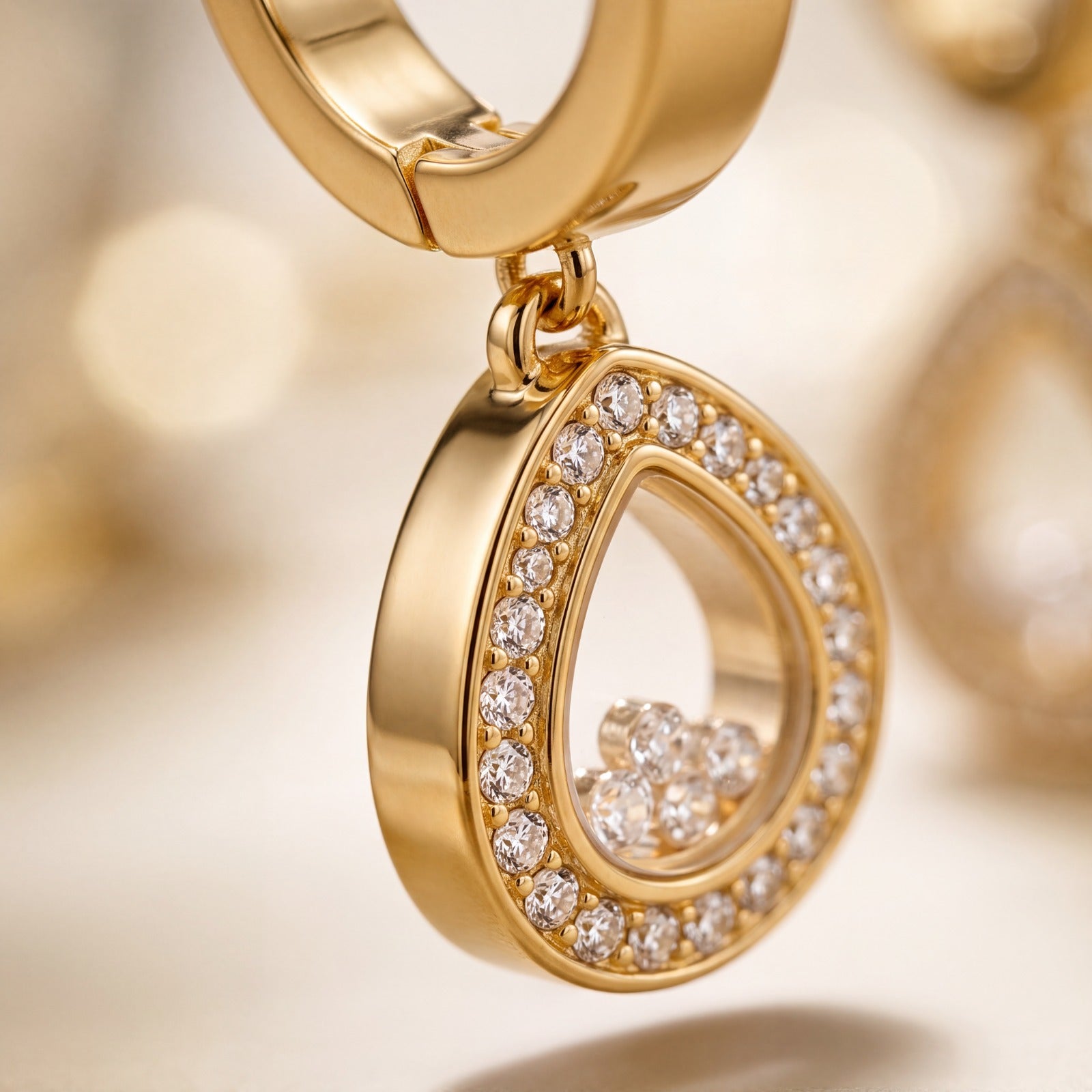 Elegant Gold-Plated Teardrop Huggie Hoop Earrings with Floating Crystals